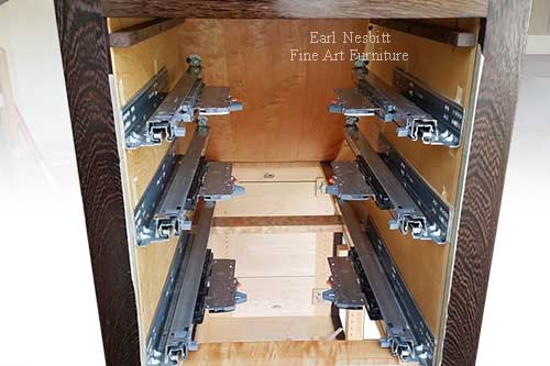 invisible undermount drawer guides inside luxury cabinet
